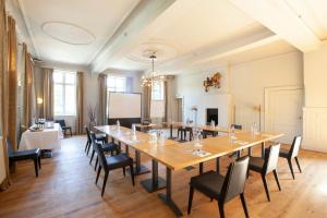 Area soggiorno di Hotel The Lodge Heverlee