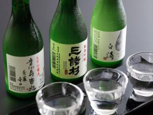 three bottles of wine and two glasses of water at Wakasa Annex in Nara