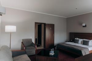 Postel nebo postele na pokoji v ubytování Hotel 4x4