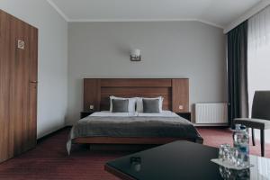 Postel nebo postele na pokoji v ubytování Hotel 4x4