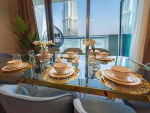 Un lugar para sentarse en FIRST CLASS 3BR with full BURJ KHALIFA and FOUNTAIN VIEW