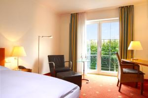 Postel nebo postele na pokoji v ubytování Hotel Zielonka + 25 fotografií