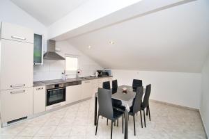 Kuchyň nebo kuchyňský kout v ubytování Apartman ZORKA