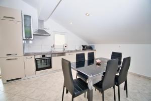 Kuchyň nebo kuchyňský kout v ubytování Apartman ZORKA