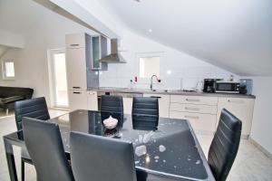 Kuchyň nebo kuchyňský kout v ubytování Apartman ZORKA