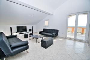TV a/nebo společenská místnost v ubytování Apartman ZORKA
