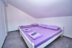 Postel nebo postele na pokoji v ubytování Apartman ZORKA