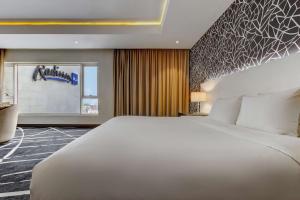 Katil atau katil-katil dalam bilik di Radisson Blu Lagos Ikeja