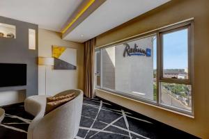 Televisyen dan/atau pusat hiburan di Radisson Blu Lagos Ikeja