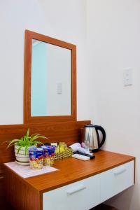 Příslušenství pro přípravu čaje a kávy v ubytování Phuc Con Son Hotel