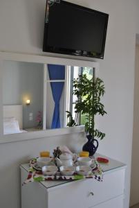 TV a/nebo společenská místnost v ubytování Hotel Helios Splendid