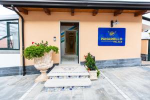 a building with a sign that reads pampucula police at Panariello Palace in Agerola