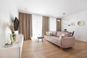 Televízia a/alebo spoločenská miestnosť v ubytovaní Easy Rent Apartments - Centrum 2