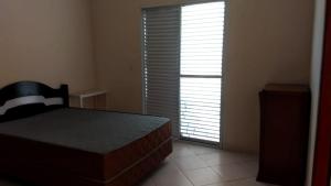 Billede fra billedgalleriet på Incrivel casa com churrasq e piscina em Peruibe i Peruíbe