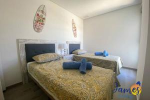 Ένα ή περισσότερα κρεβάτια σε δωμάτιο στο Green Hills Getaway Apart with Pools & Spa EB7 +30 φωτογραφίες