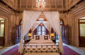Krevet ili kreveti u jedinici u okviru objekta The Laxmi Niwas Palace