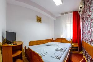 Кровать или кровати в номере Motel Dasiana