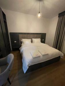 Ένα ή περισσότερα κρεβάτια σε δωμάτιο στο Hotel SH & SH