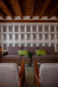 a living room with a couch and a table at Ca' della Scimmia - Rialto Bridge, Venice in Venice