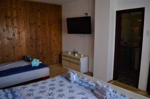 Postel nebo postele na pokoji v ubytování Šurička bajka