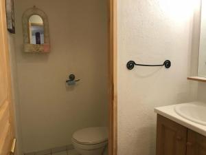 a bathroom with a toilet and a sink at Studio Montgenèvre, 1 pièce, 3 personnes - FR-1-445-137 in Montgenèvre