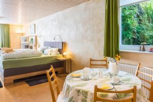 Postel nebo postele na pokoji v ubytování Ferienwohnung Grünspecht