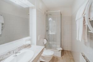 A bathroom at Hotel am Kapuzinerplatz
