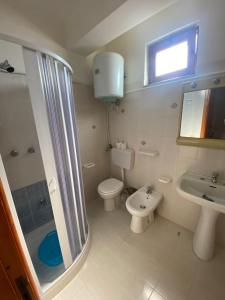 Ein Badezimmer in der Unterkunft L’Oasi Saracena