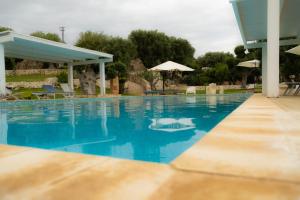 The swimming pool at or close to Casetta Letizia