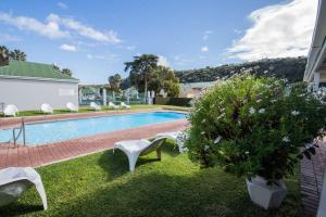 Swimming pool sa o malapit sa Thirty River Club Villas managed by The Paper Fig House