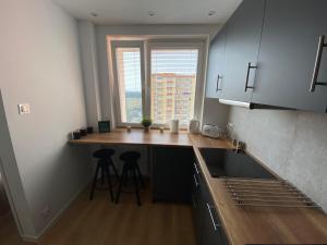 Kuchyňa alebo kuchynka v ubytovaní Apartament Bajka