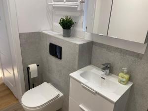 Kúpeľňa v ubytovaní Apartament Bajka