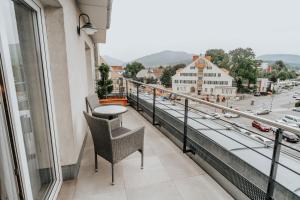 En balkon eller terrasse på Hotel am Kapuzinerplatz