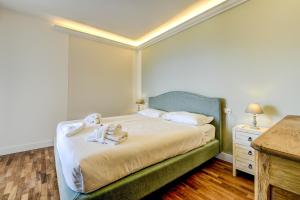 Posteľ alebo postele v izbe v ubytovaní Villa Caterina