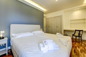Posteľ alebo postele v izbe v ubytovaní Villa Caterina