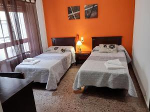 Postel nebo postele na pokoji v ubytování Hotel Azahar