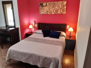 Postel nebo postele na pokoji v ubytování Hotel Azahar