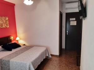 Postel nebo postele na pokoji v ubytování Hotel Azahar