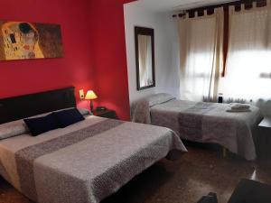 Postel nebo postele na pokoji v ubytování Hotel Azahar