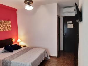 Postel nebo postele na pokoji v ubytování Hotel Azahar