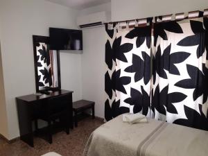 Postel nebo postele na pokoji v ubytování Hotel Azahar