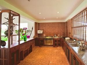 Η κουζίνα ή μικρή κουζίνα στο Hotel Cinaruco Caney