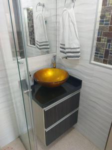 a bathroom with a bowl sink on a counter at La Bendición Tunja 401 in Tunja +14 photos