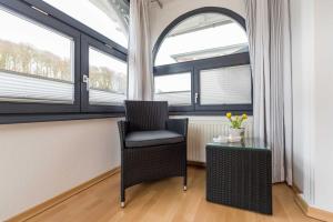 Posezení v ubytování Haus am Meer Wintergarten PH 7, 2 SZ, strandnah by Unsere Urlaubszeit