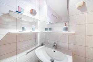 Koupelna v ubytování Haus am Meer Wintergarten PH 7, 2 SZ, strandnah by Unsere Urlaubszeit