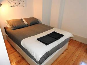 A bed or beds in a room at Oporto Delight 3 Luxury Apartment in Historic Center Max 5p