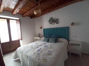 Postel nebo postele na pokoji v ubytování PEÑAFIEL DREAMS con JACUZZI