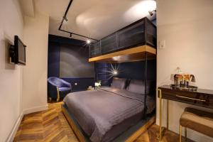 Ένα ή περισσότερα κρεβάτια σε δωμάτιο στο Concept Nisantasi Hotels & Spa
