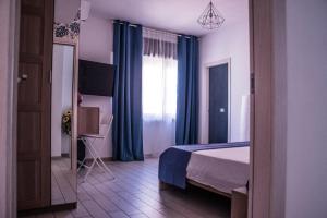 Posteľ alebo postele v izbe v ubytovaní Walk Rooms