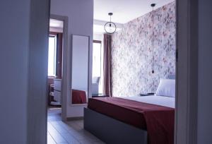 Posteľ alebo postele v izbe v ubytovaní Walk Rooms